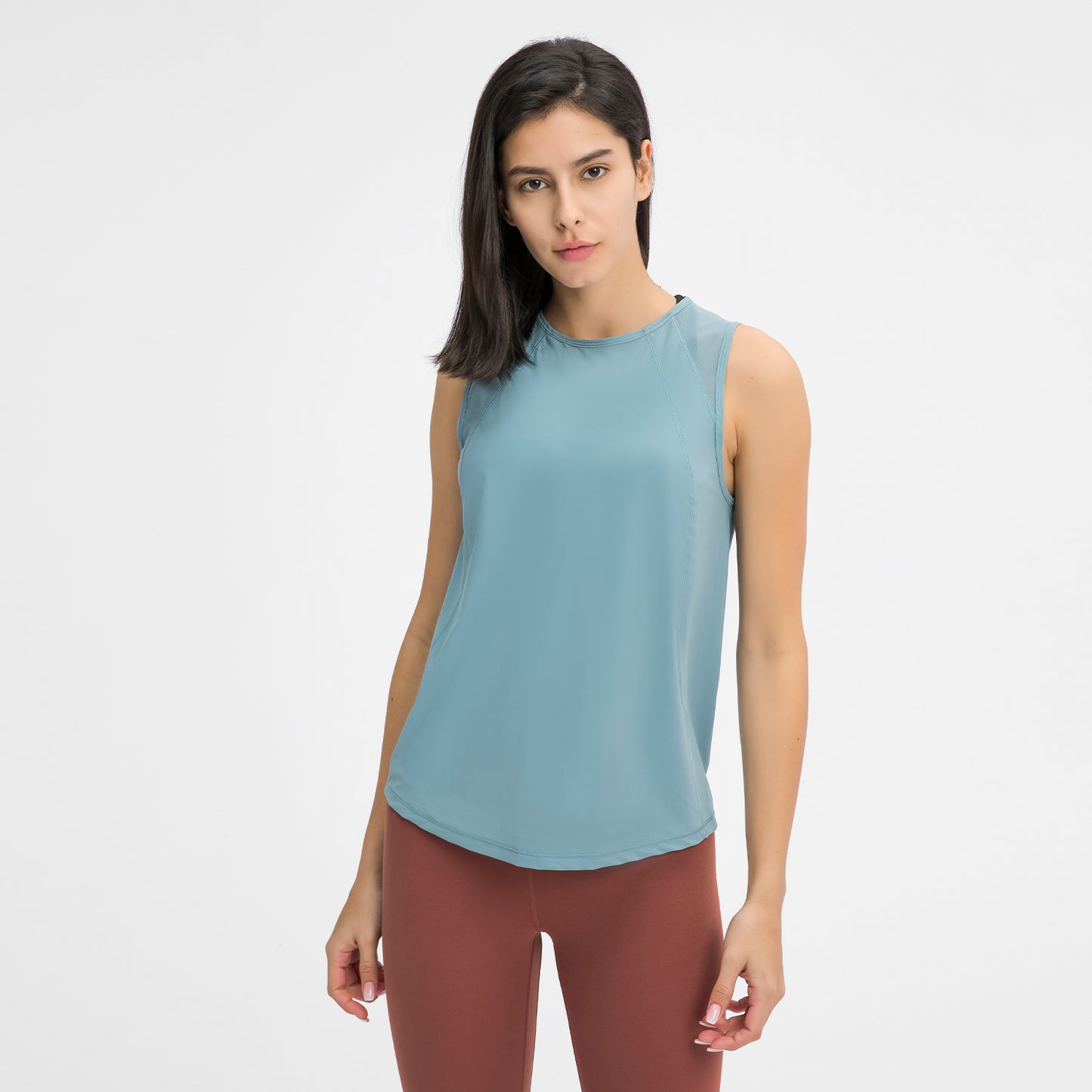 Women's Sports Vests & Yoga Tank Tops - Hollow Mesh Out Back. This super comfortable tank top is made from nylon and spandex breathable materials that are durable, quick-dry and have great stretchable abilities giving you a comfortable and flexible feel. Its suitable for jogging, yoga, gym and is comfortable for leisure wear.
