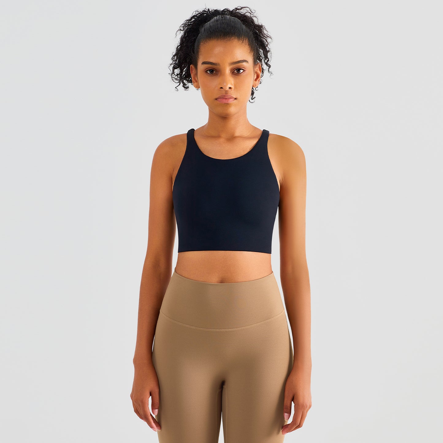 Women's Sports Bra Cross Backless Gym, Yoga & Tank Top. This super comfortable sports bra is made from nylon and spandex breathable materials that are durable, quick-dry and have great stretchable abilities giving you a comfortable and flexible feel. Its suitable for jogging, yoga, gym and is comfortable for leisure wear.