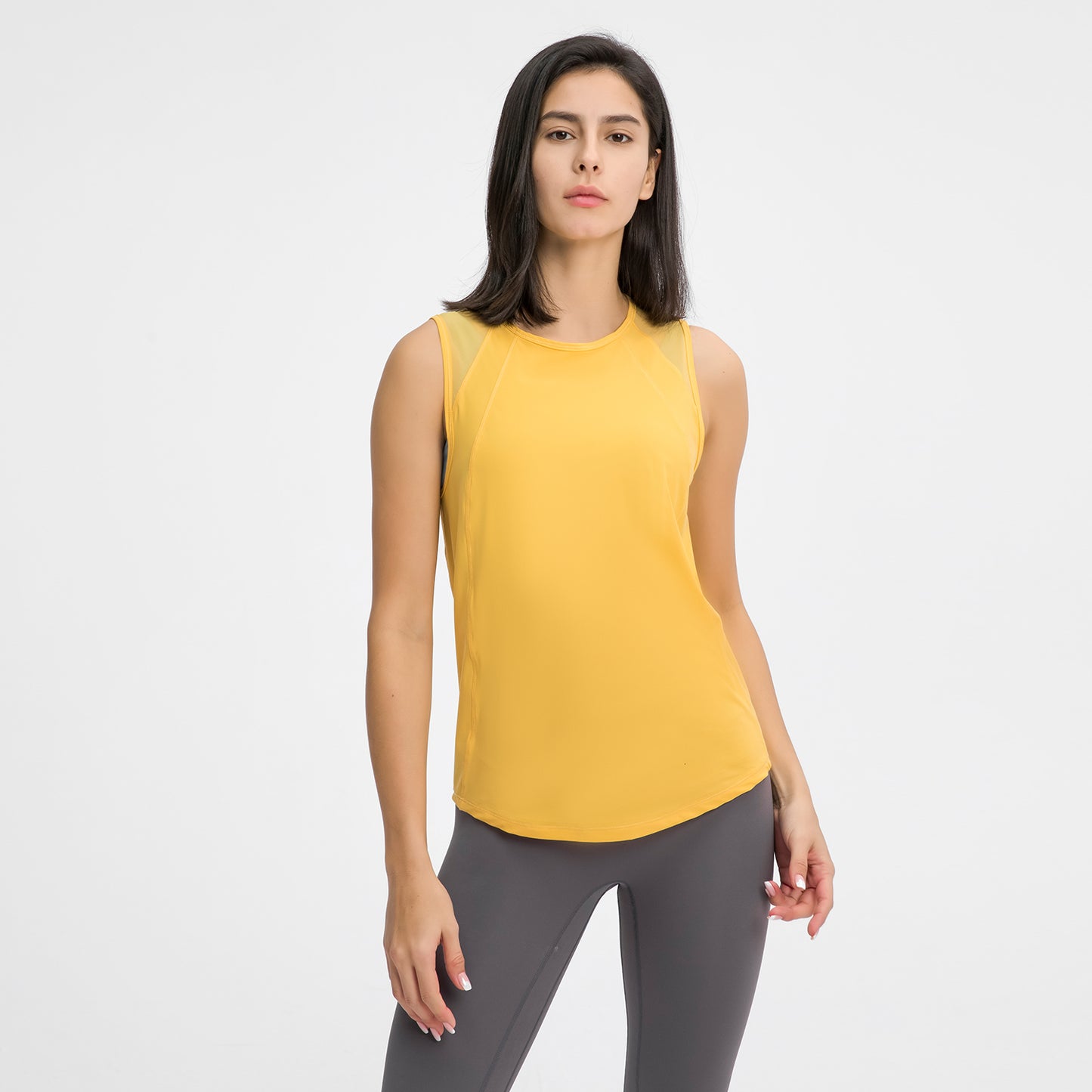Women's Sports Vests & Yoga Tank Tops - Hollow Mesh Out Back. This super comfortable tank top is made from nylon and spandex breathable materials that are durable, quick-dry and have great stretchable abilities giving you a comfortable and flexible feel. Its suitable for jogging, yoga, gym and is comfortable for leisure wear.