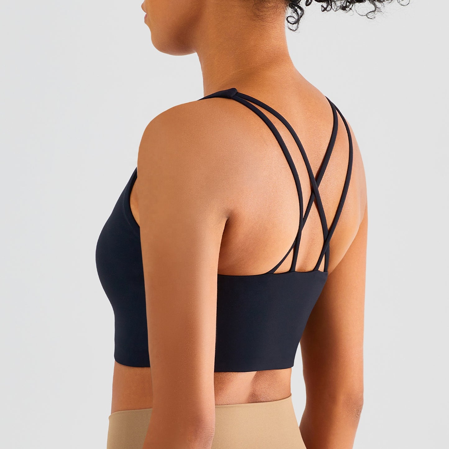 Women's Sports Bra Cross Backless Gym, Yoga & Tank Top. This super comfortable sports bra is made from nylon and spandex breathable materials that are durable, quick-dry and have great stretchable abilities giving you a comfortable and flexible feel. Its suitable for jogging, yoga, gym and is comfortable for leisure wear.