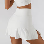 Women's 2 In 1 High Waist Pleated Tennis Skirts offers the ultimate comfort and keeps you cool during those intense tennis matches. Its ultra flexible and can stretch to enable you to reach those tricky low balls and execute offense when under pressure.